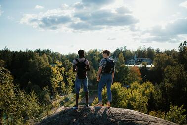 Boys on the rock, an illustrative photo.