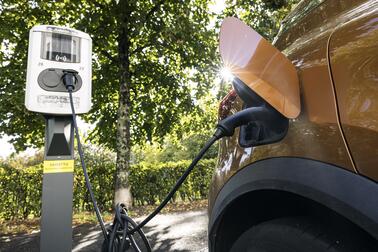 Electric car being charged.