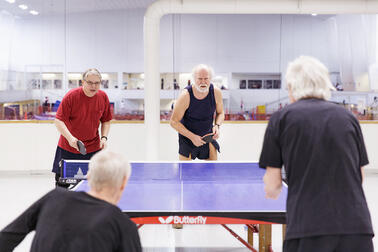 Ping pong players.