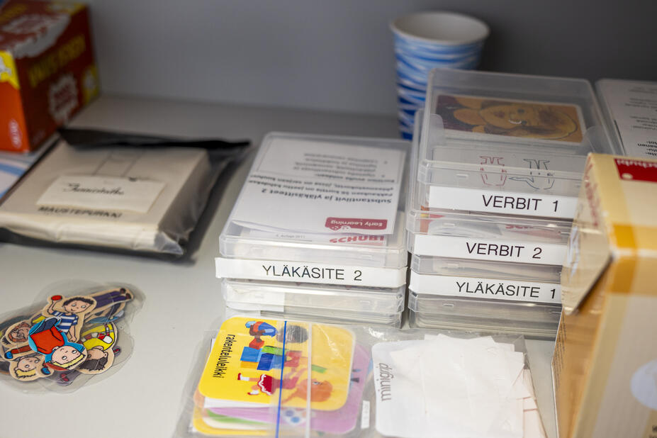 Finnish learning materials on a table