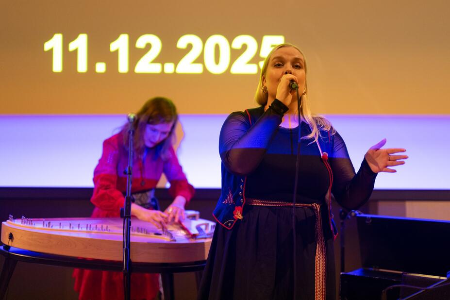 Kantele player and the singer of a folk music duo.