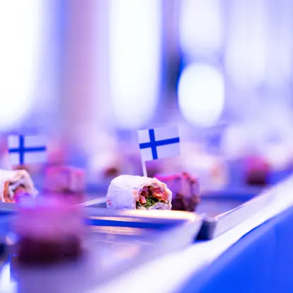Food with small Finnish flags.