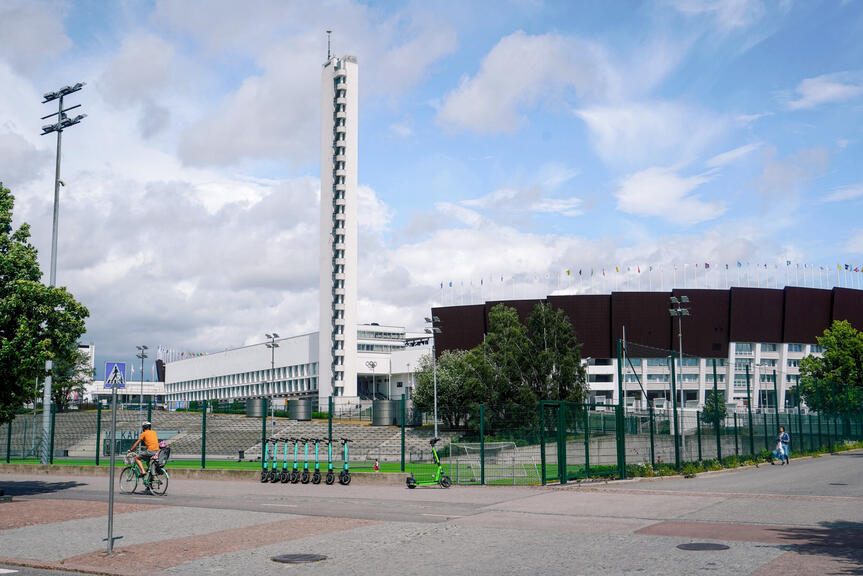 Helsinki Olympic Stadium in partly cloudy summer weather.