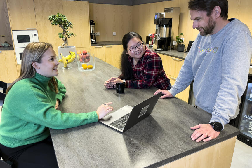 People at a laptop.