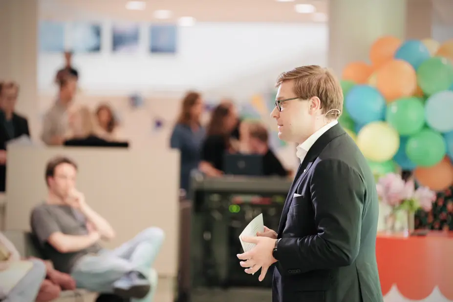 Mayor Sazonov speaking at Helsinki Welcome Day event.