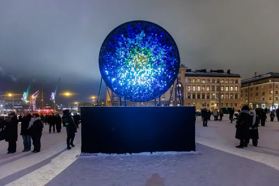 Sébastien Lefèvre’s light artwork Soleil nuit Albireo, which is blue and circular.