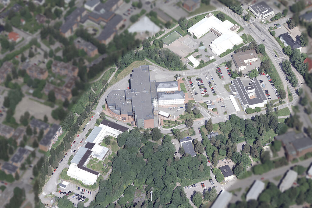 Flygbild av sjukhusområdet i Malm, där byggnaderna på planeringsområdet är markerade.