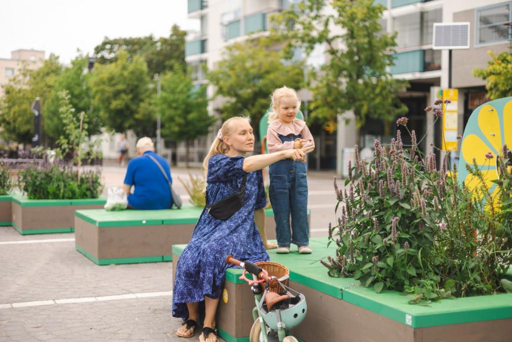 in the last ten years, Helsinki has used design to renew many services and public spaces. Picture from the Malmi placemaking experiment in Summer 2022. Photo: RaivioBumann/ Vesa Laitinen