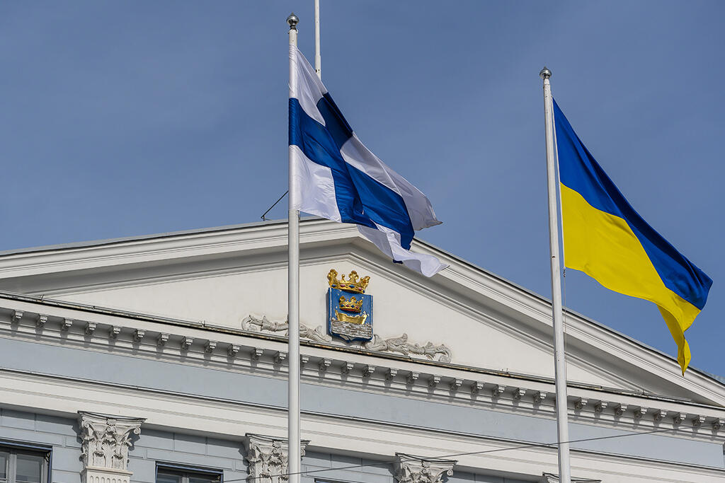 The Finnish and Ukrainian flags are on display at Helsinki City Hall.