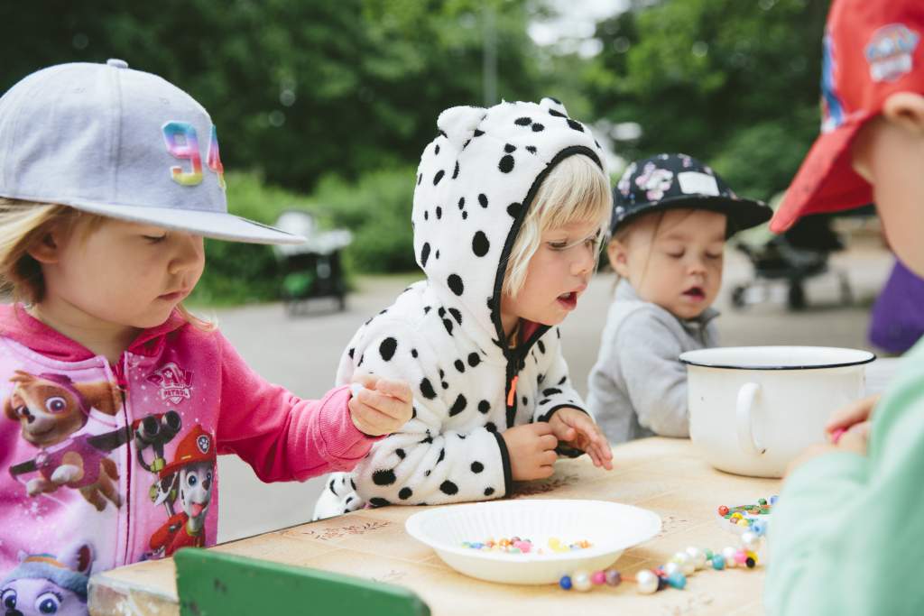 Children having a meal at a playground
