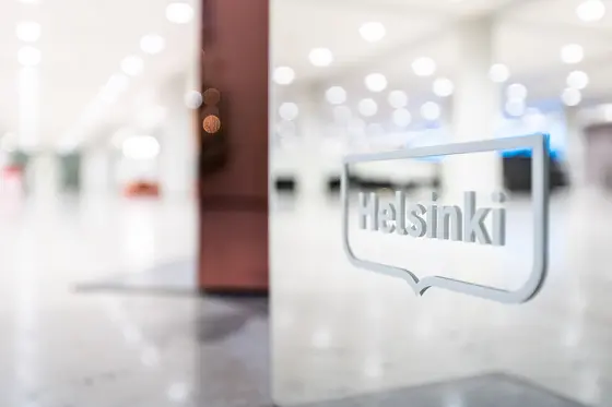 The Helsinki logo in the City Hall lobby.