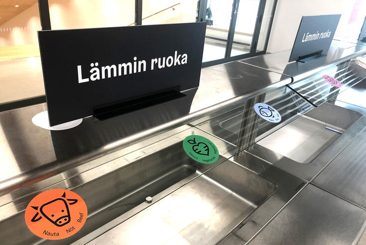 Palvelukeskus Helsinki uses icons to support the text in food stations.