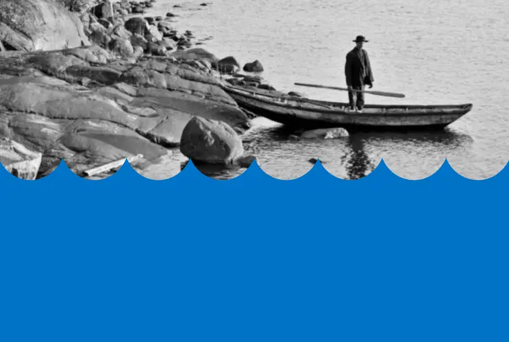 Historiallinen mustavalkoinen kuva ja sininen korokuvio. 