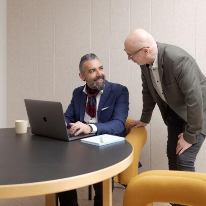 Two people are working.