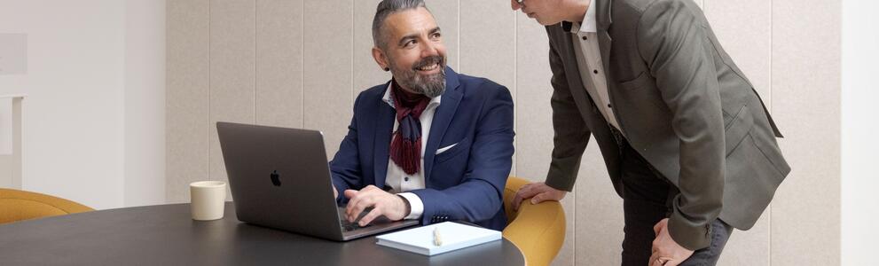 Two people are working.